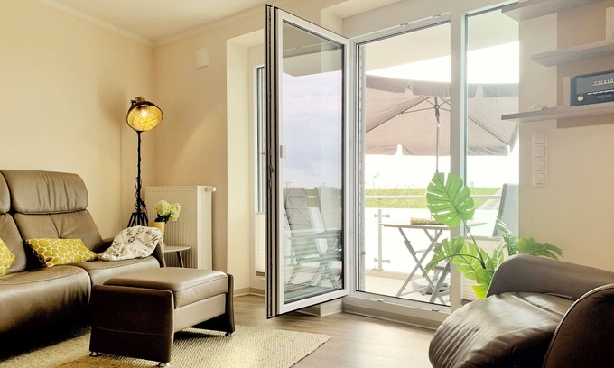 Wurster Nordseekuste Apartment | Modern vacation apartment directly on the North Sea dike