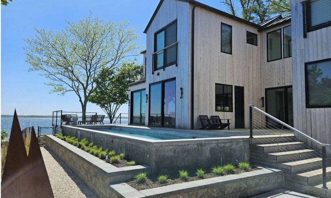 Aquebogue House | Modern Zen beach oasis with pool in Jamesport Bay.