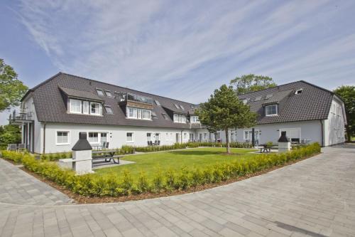 Gross Zicker Apartment | moderne Ferienwohnung mit Gartennutzung - Haus Inselwind FeWo MEERbucht