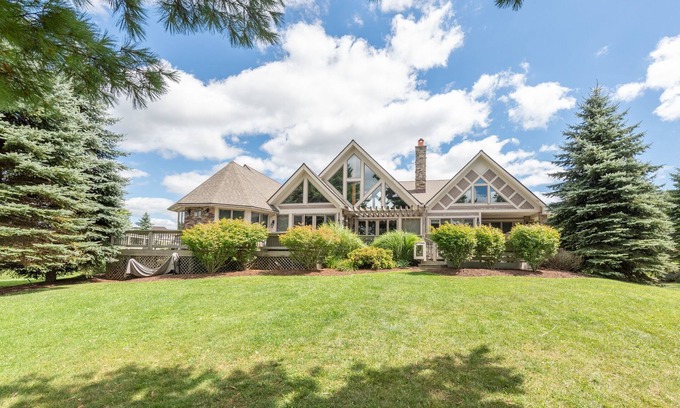 Waterfront Greens House | Moondancer: Lakefront, Hot Tub, Dock Slip, Fire Pit!