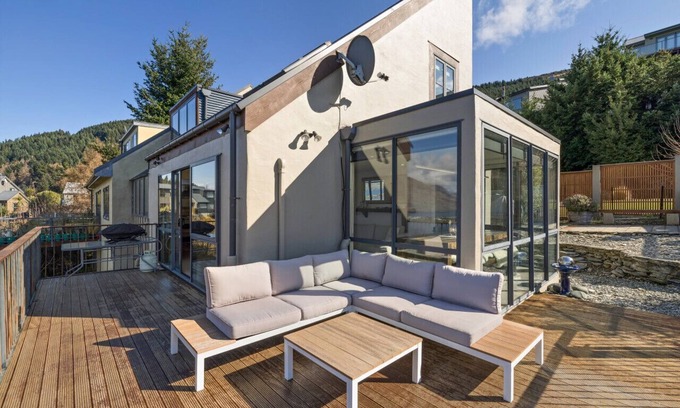 Queenstown House | Mountain and lake views and wood burner inside.