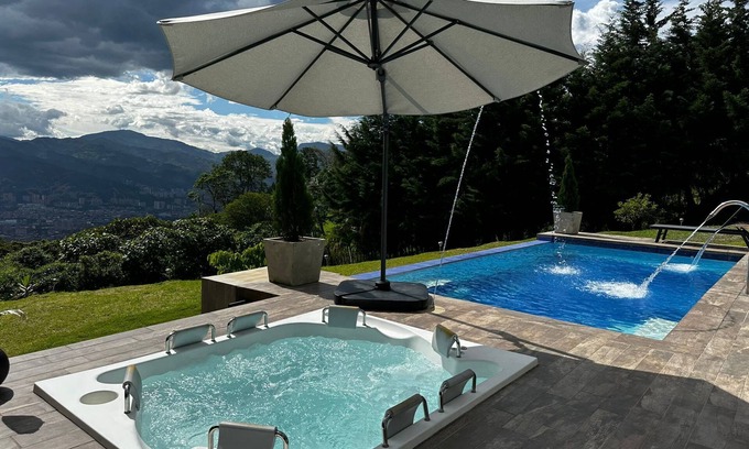 Envigado House | Mountain Mansion: Pool, 6 Person Jacuzzi, Epic Medellin Views/5 Total Bedrooms