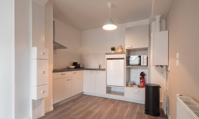 Nord - Gare Apartment | NATHAN - Appartement proche gare, arrivée 24/24