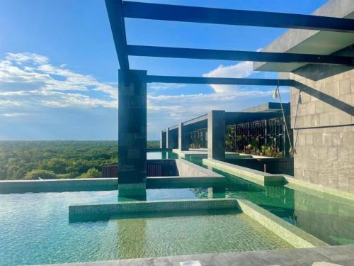 Zona Hotelera Apartment | New Condo in Premier Location