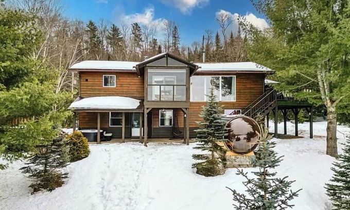 Joly Cottage | New cottage on Forest Lake with a spectacular sunset views and fun on the water!