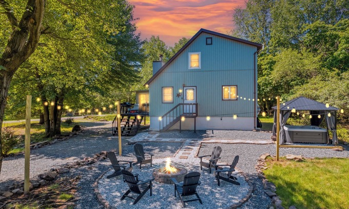 Tunkhannock Township Cottage | New! Hot Tub, Fire-pit, Shuffleboard, Game Room, Kids Play Area and More!