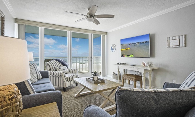New Smyrna Beach Condo | New listing! Direct oceanfront condo with a balcony, heated pool, and tennis court