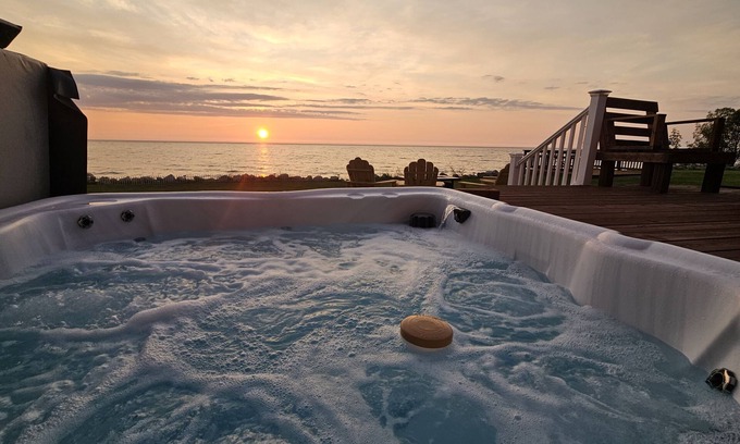 Mears House | New! Luxurious 5-bedroom home on Lake Michigan w/hot tub and lake access—Mears