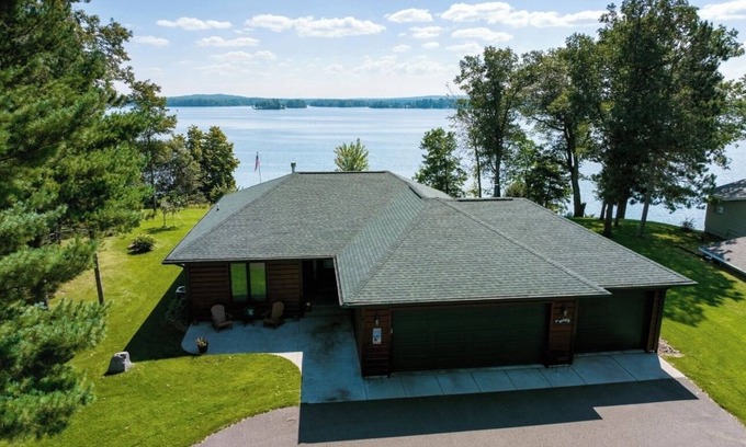 Spooner House | New Nautical Neighbors Lake Home on Spooner Lake, sleeps 16