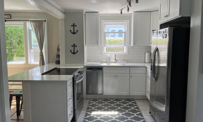 Silver Beach Cottage | New Silver Beach Cottage just a short walk to association beach and harbor!