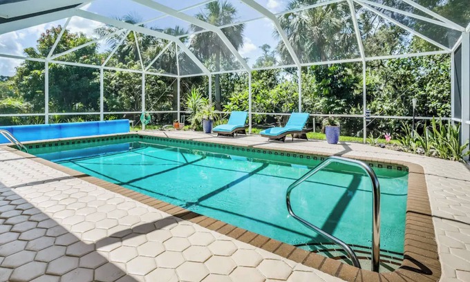 Fort Myers House | NEW! Waterfront Heated Pool, Kayaks, Fishing Pier, Fire Pit w/office