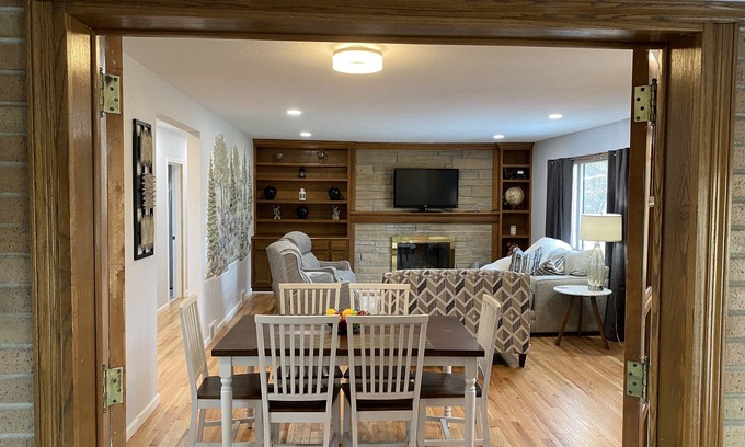 Des Moines House | Newly Remodeled Brick Home with wall Sculptures by the Airport