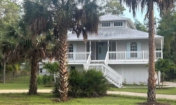 Naples House | Newly remodeled Key West Style home with wrap around porch