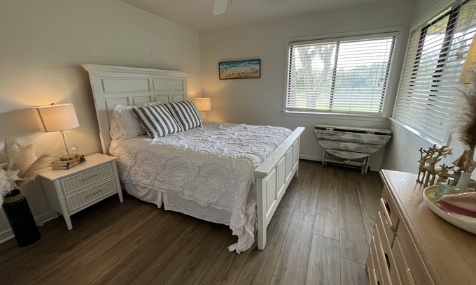 Ocean Ridge House | Newly remodeled-Screened in porch overlooking the 4th tee box.
