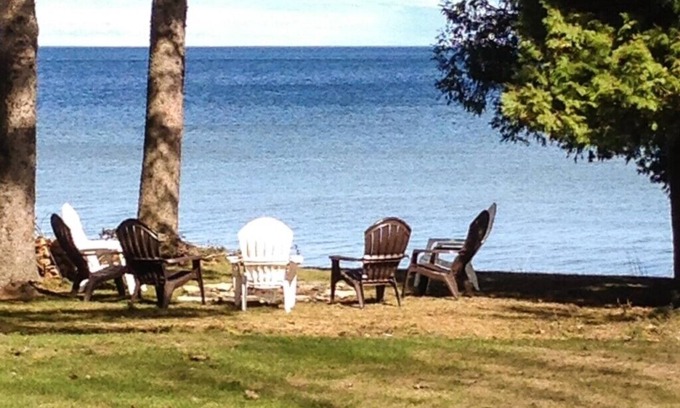 Baileys Harbor House | Newly Remodeled Waterfront Log Cabin with Boat House and Pier