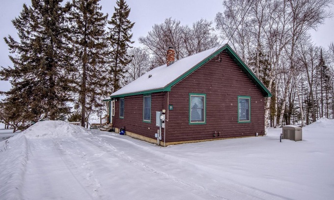 Rangeley Plantation Cabin | Niboban Cabin 5 right on Rangeley Lake with a screened porch, fire pit, hammock, WiFi and dock!