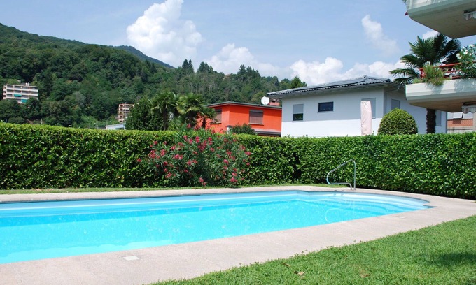 Caslano Apartment | Nice apartment for 4 guests with pool, WIFI, TV, patio, pets allowed and parking