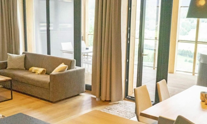 Haus im Ennstal House | Nice apartment in villa for 4 guests with private pool, WIFI, TV, balcony and parking