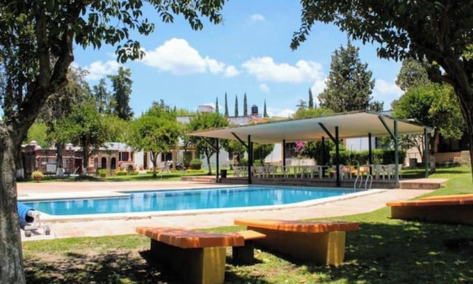 La Magdalena House | Nice house in front of the pool, lake and green area!