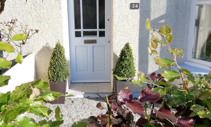 Par House | No. 24 is a spacious family home, within a 5 min walk to a dog friendly beach.