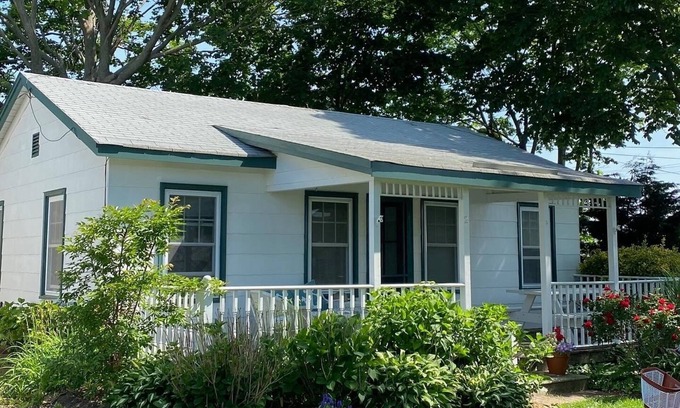 Town of Southold Town House | North Fork water-view Cottage in coveted beach hamlet New Suffolk.