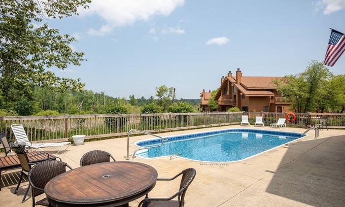 Mancelona Condo | Northern Michigan paradise! sleeps 7 KING bed. Private association outdoor pool