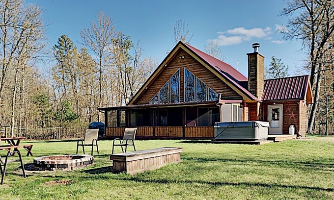 New Lisbon Cabin | Northwoods Getaway- Private swimming pond, hot tub, & 70 acres of woods