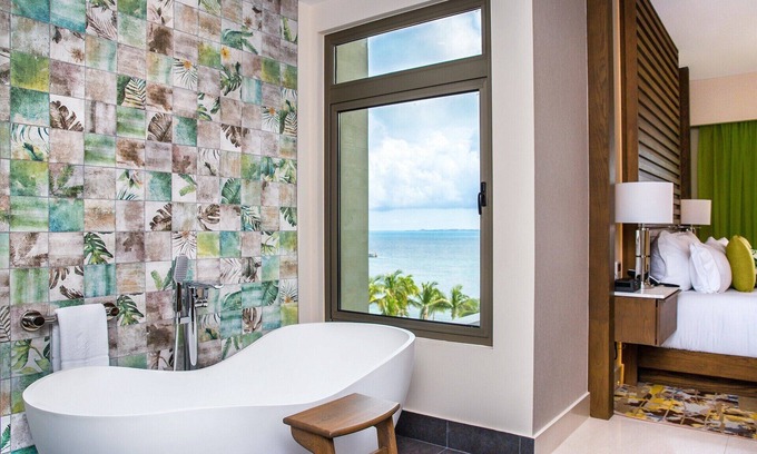 Playa Mujeres Condo | Ocean Bliss: Lavish 3BR Beachfront Residence, Private Jacuzzi & Panoramic Views