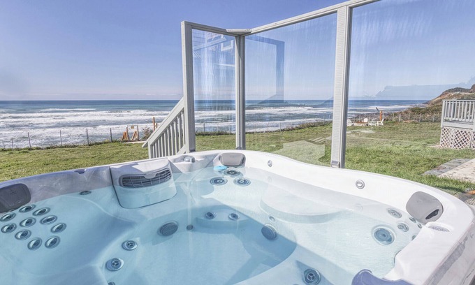 Oregon Coast House | Ocean Front Home! Sleeps 12! Five Bedrooms + Guest Cottage! Hot Tub!