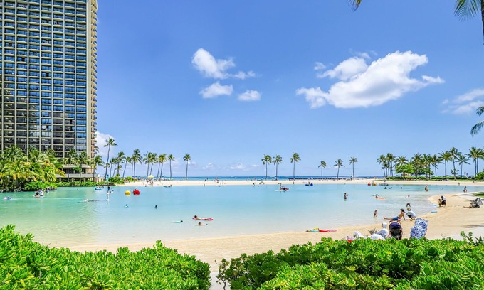 Waikiki Apartment | Ocean & Harbor view Waikiki getaway with a covered lanai - walk everywhere