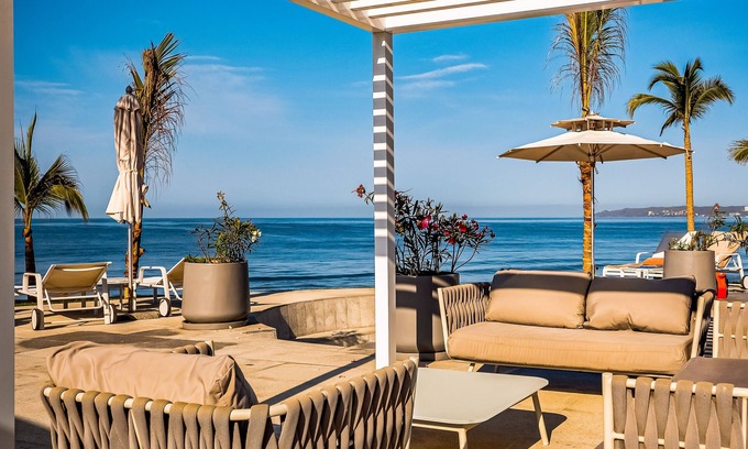 Flamingos Condo | Ocean-view 5th-floor condo with 4 pools, sauna, steam room, huge balcony, & gym
