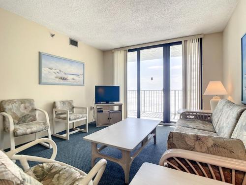 New Smyrna Beach Apartment | Ocean View with a beachfront pool at Ocean Trillium Condo ~ 402