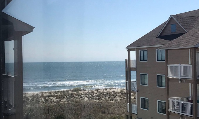 Wilmington Beach Condo | Ocean Views from Condo and Steps From Water! Create Your Best Memories Here!