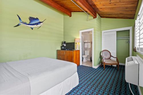 Fort Pierce House | Oceanfront Inn Room #14- Inlet View- King Bed