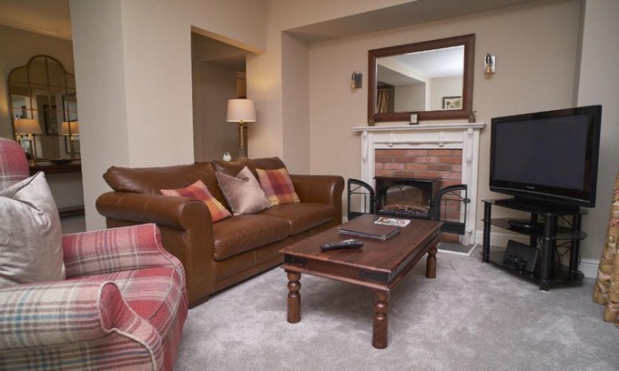 Grasmere House | Old Bakers Cottage ground floor apartment centrally located in Grasmere with patio area
