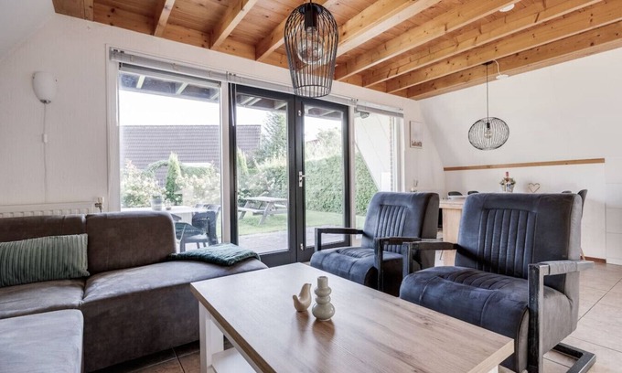 Zwiggelte House | Ortelan I Pleasant Residence with Seating Area in Garden