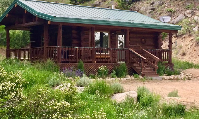 Red Lodge House | Our cozy, secluded cabin is nestled in Haywood Gulch with spectacular views of the Beartooth Mountains. Open layout cabin with full kitchen with dining table and chairs. Comfortable plush queen log bed. Futon couch T.V. Great deck with seating areas,