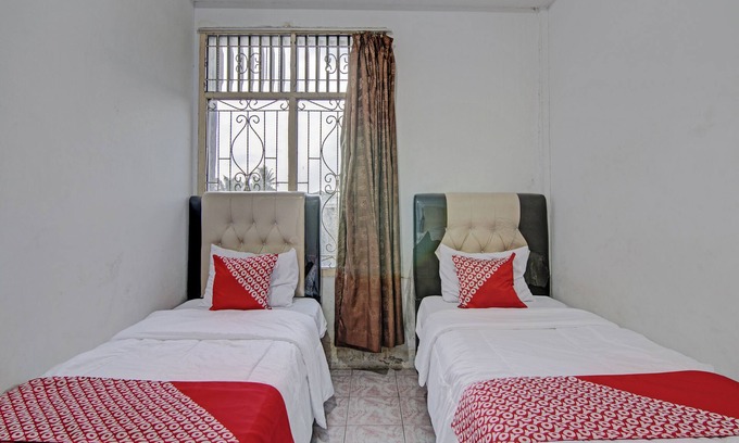 Jago Hotel | OYO 92746 Wisma 35NearTaman Wisata Polong Jopang