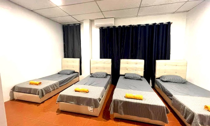 Tawau House | OYO HOME 90768 Flo Inn Motel