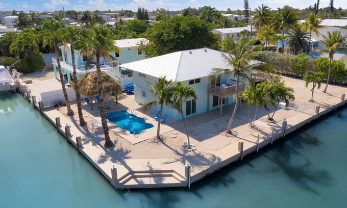 Marathon House | Palmas Del Mar: 210' of waterfront, pool, tiki hut, putting green, kayaks, games