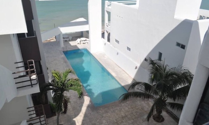 Chicxulub Puerto Condo | Paradisiac apartment facing the sea
