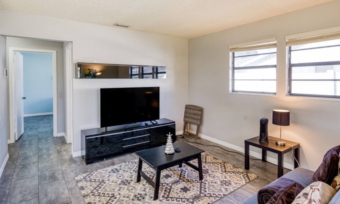 Riviera Beach House | Peaceful residential retreat with golf course views, screened lanai, & home gym
