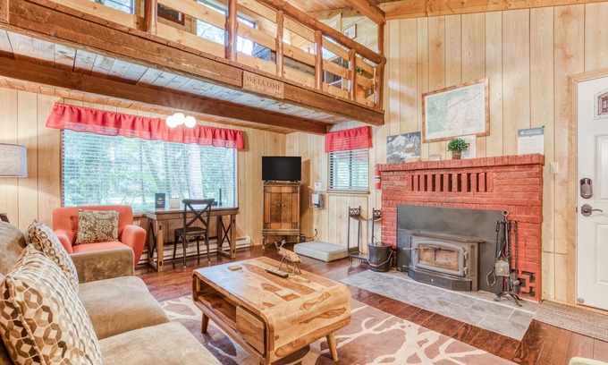 Mount Hood Village Cabin | Peaceful waterfront cabin with woodstove, spacious deck, & grill - dog friendly
