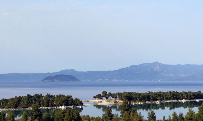 Pefkochori Villa | Pefkochori villa with a stunning panoramic view and a waterfall private pool.