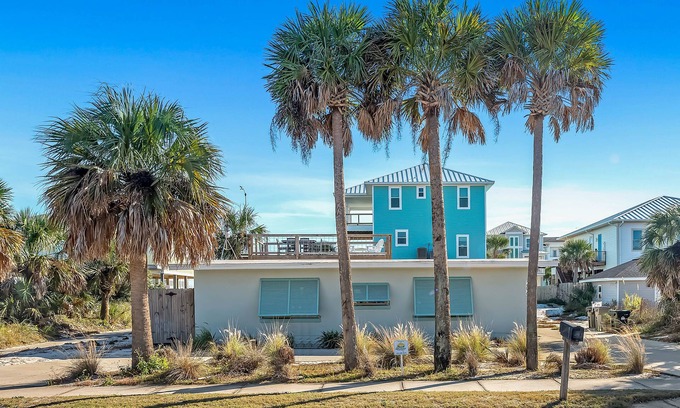 Villa Primera House | Pensacola Beach House | Elevated Deck & Outdoor Living Spaces | Beach Service | Beach Getaways