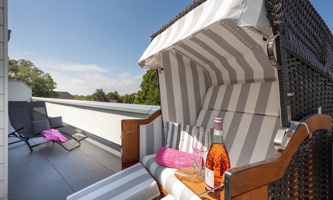 Dorumer Neufeld Apartment | Penthouse 18 - Enjoy the view. Modern. Balcony. Comfort.