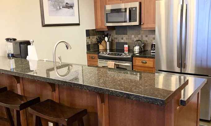 Snowmass Village Condo | Penthouse In Snowmass Base Village steps to skiing- 50 ft. to slopes, 2 hot tubs