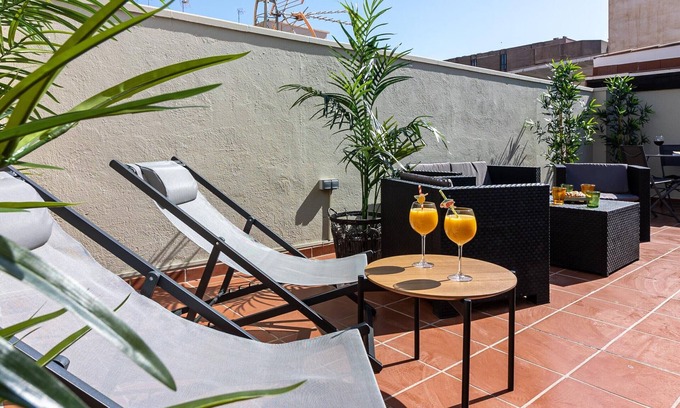 Ensanche Centro Apartment | Penthouse spacieux au centre de Malaga avec 1 chambre, balcon, WiFi, climatisation et cuisine équipée