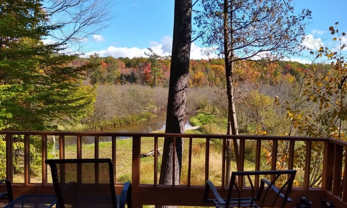 Pentwater House | Pentwater River Frontage Overlooking 100s of Wooded Acres