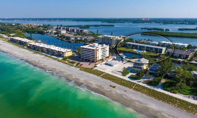 Siesta Key Condo | Perfect Location. Beautiful Waterviews. Heated Pool. 2 BD/2 BA